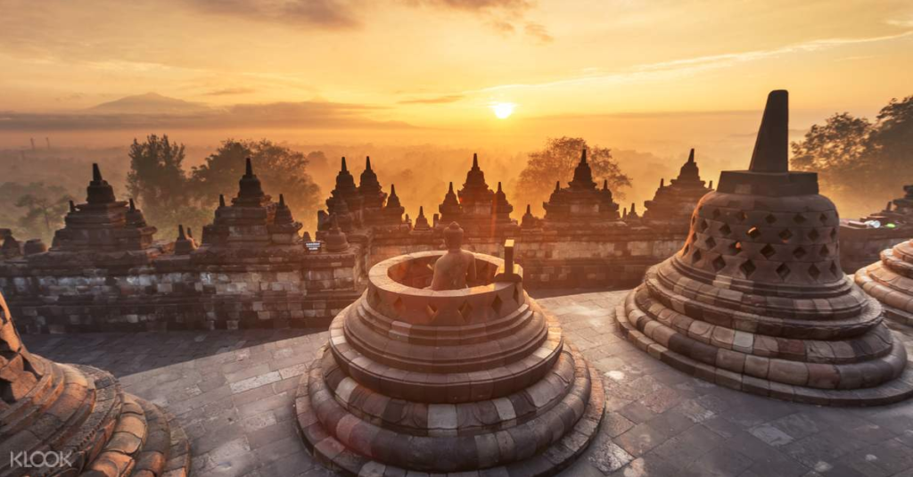 Sunrise over Borobudur Temple stupas near Yogyakarta, day tour from Bali